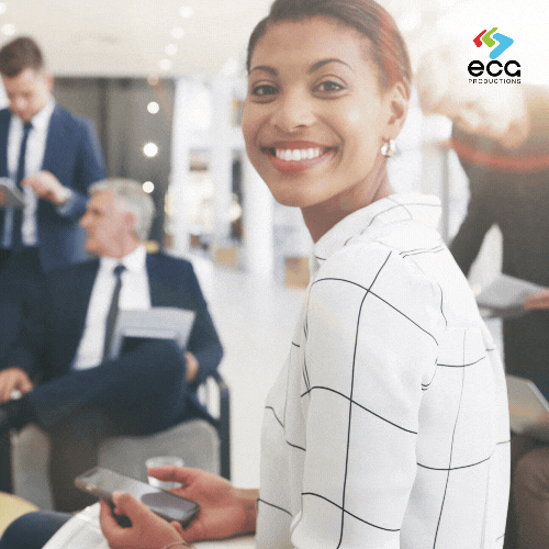 Corporate Video Production of a woman smiling at camera and laughing
