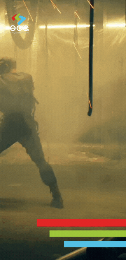 "A dramatic fight scene prelit by rigging grips, showcasing the importance of lighting and equipment setup in creating intense, cinematic moments.
