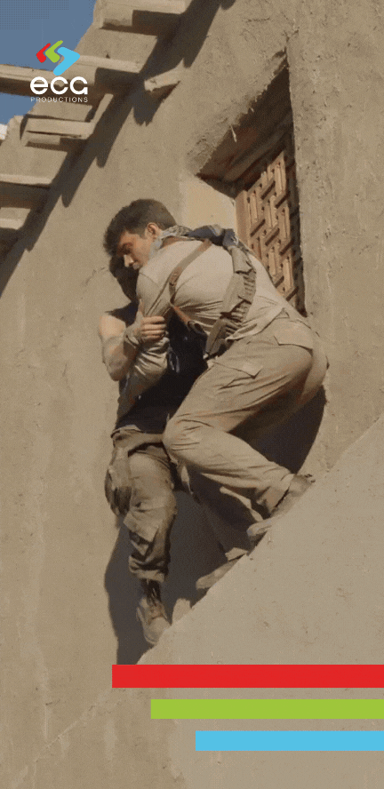 A stunt duo jumps off a building, demonstrating the thrilling and safe execution of high-stakes stunts by professional coordinators.