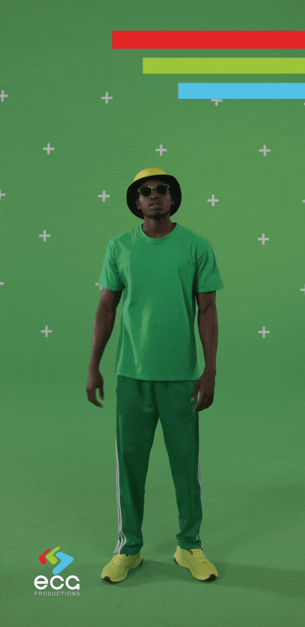 "A rapper performs on a green screen for a tracking shot, showcasing the versatility of green screen post-production and chroma key compositing in music video production.