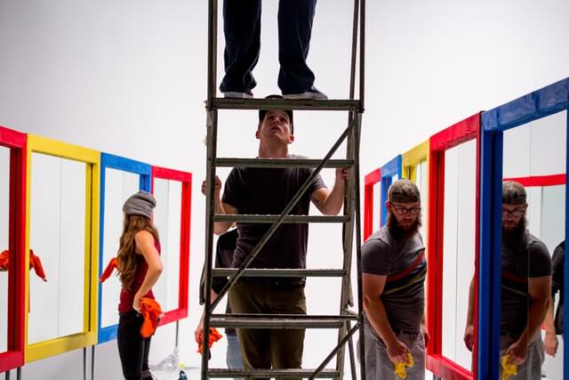 crew cleaning mirrors and using ladders MattyB shoot