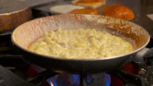 Pasta simmering in a pan
