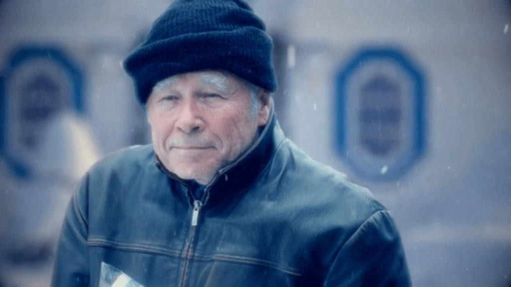 Older Man in Snow Storm