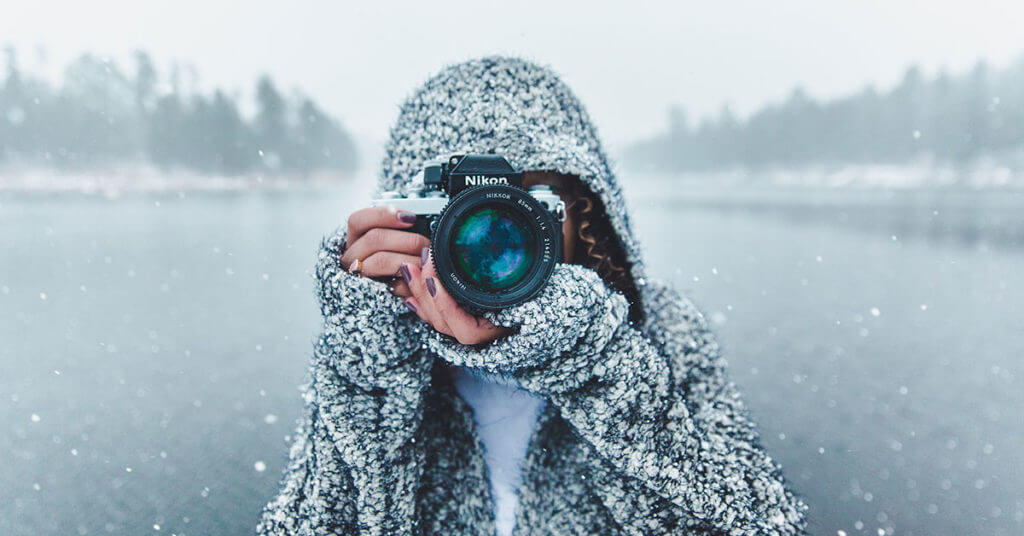 photographer out in the cold working