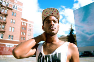 Man in sun with a visor.