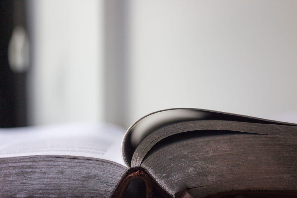 An open book sitting on a table.