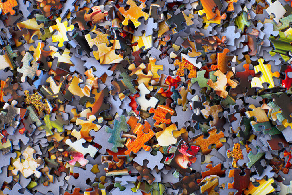 Hundreds of puzzle pieces representing the film industry