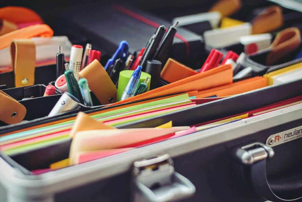 Pens and Post-It notes can help with creative organization.