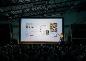 Livestream conference presenter gives talk in 360º video photo