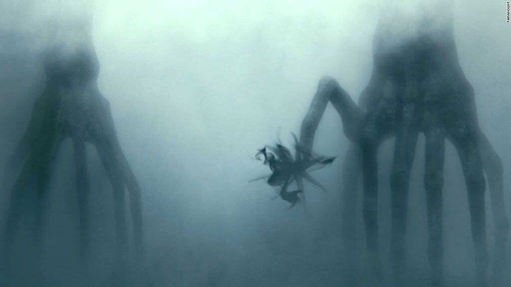 Two aliens in a foggy background communicate with different pitches that sound designers gave them to him personify their characters.