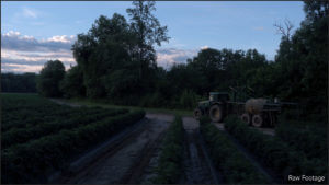 The original image of a farm tractor before color grading.