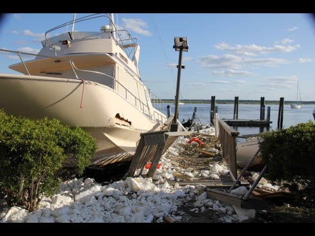 A shipwrecked boat alongside other debris awaits help from the Georgia Department of Natural Resources in the aftermath of Hurricane Irma.