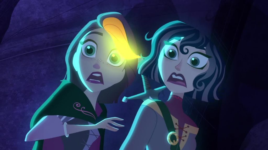 Rapunzel and Cassandra stare at the miracle flower that once saved Rapunzel’s mother.