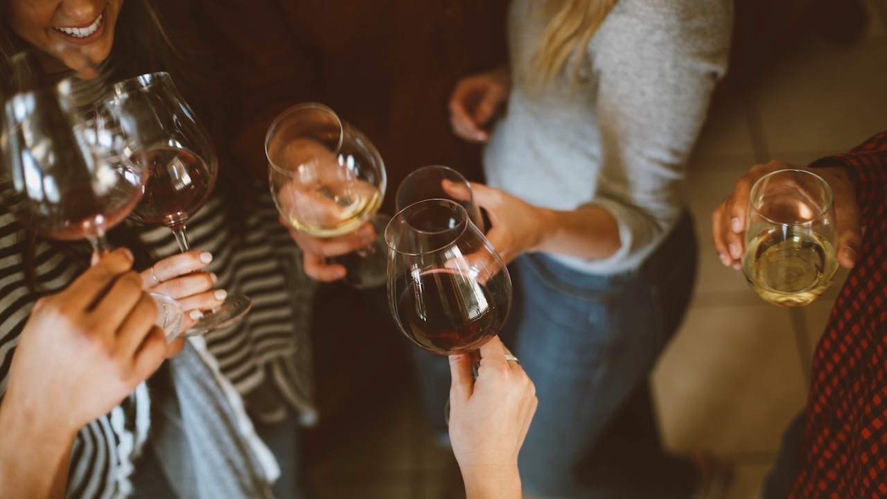 Six people toasting.