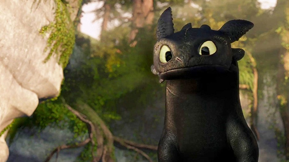 How to Train Your Dragon - A young, curious dragon stares intently.