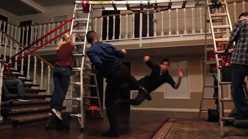 Stuntman falls from ladder in living room