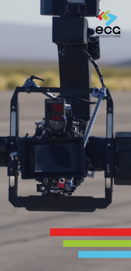 A camera mounted on a jib smoothly tracks over a road, highlighting the precision and planning involved in commercial scriptwriting for automotive advertising.