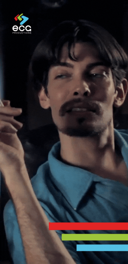 A townie smokes a cigarette while scheming a crime, showcasing the character development and suspense crafted through narrative scriptwriting.
