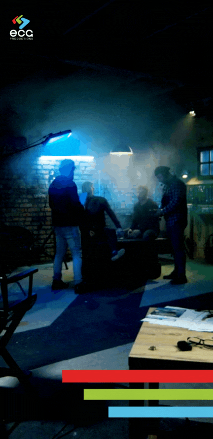 The Lighting Department at work on an active television show set, skillfully positioning lights and modifiers to create a polished, professional look for broadcast production.