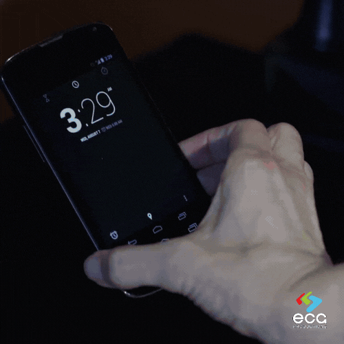 A shot from ECG Productions’ Theravent commercial featuring a woman looking at her phone as a train crashes through her house, showcasing the impact and precision of TV commercial trafficking services.