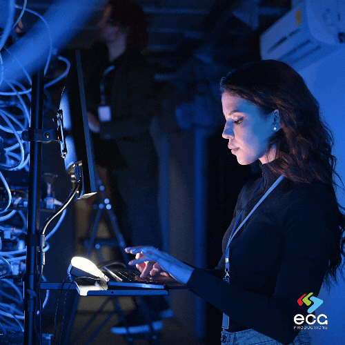 A video engineer works in the SAN room, preparing files for mastering, showcasing the technical precision and expertise required in video mastering.