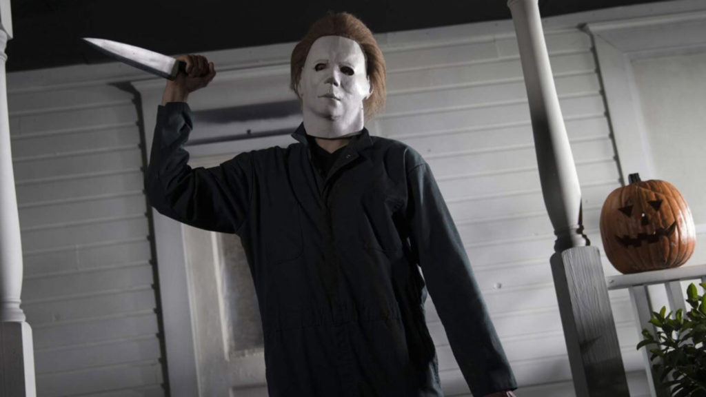 A film still of Mike Myers with a knife from the horror movie, "Halloween."