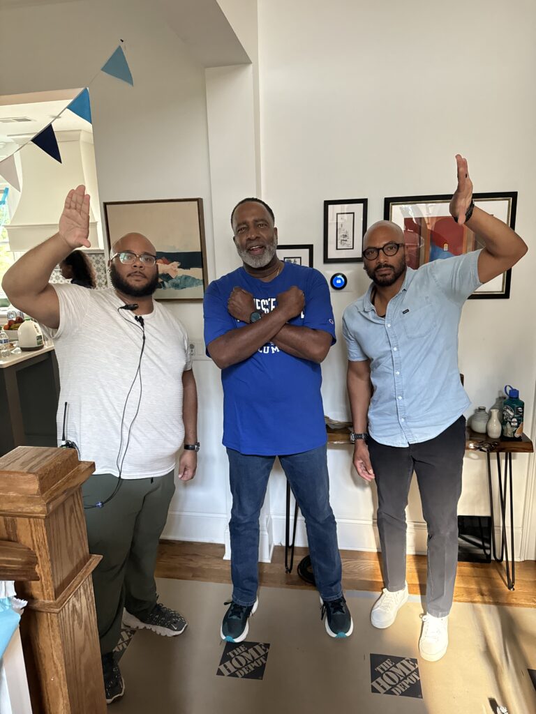 A cast member from P&G’s HCBYou commercial stands alongside an ECG producer and P&G clients, capturing the collaborative effort in creating this campaign.