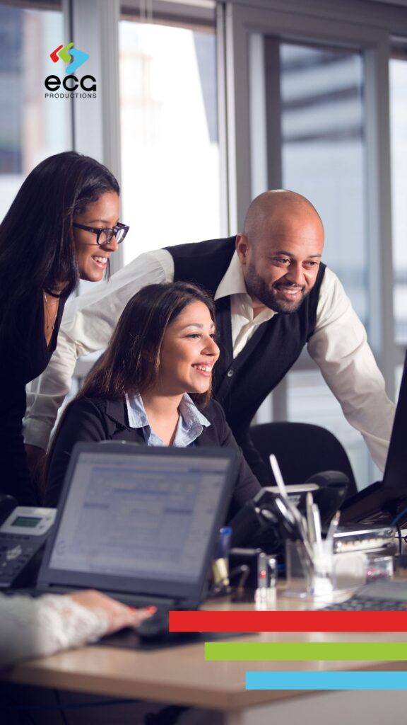 Marketing team gathered around a screen reviewing a commercial edit using Frame.io—demonstrating collaborative feedback and precision editing as key steps in how to make a TV commercial that stands out.