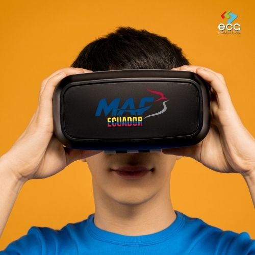 Young person wearing a VR headset branded with "MFA Ecuador" against a vibrant orange background—highlighting the immersive storytelling potential of VR Filmmaking in modern content creation.