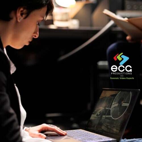 Professional analyzing surveillance footage on a laptop in a dimly lit room, with “Forensic Video Experts” branding—illustrating the precision and reliability of video expert witness services in legal investigations and courtroom settings.