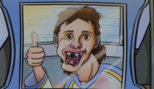 A hockey player with missing teeth gives a thumbs up.