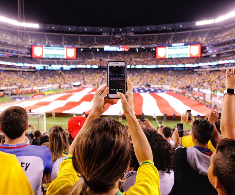 live-event-phone-stream person-streaming-live-event-on-phone